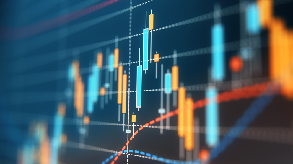 Computer showing investment graphs