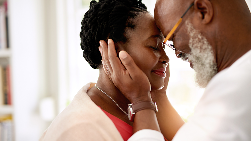 Mature Couple embracing each other