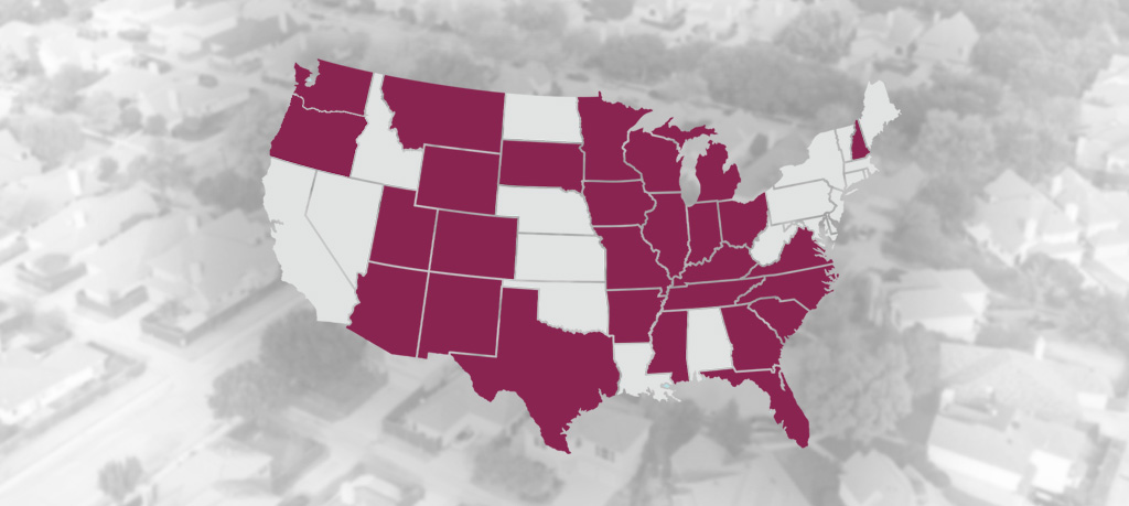 A stylized map of the contiguous United States. Certain states are filled in with a deep burgundy color, while others are light gray. The map is superimposed on a faded, aerial view of a suburban neighborhood with houses and trees.