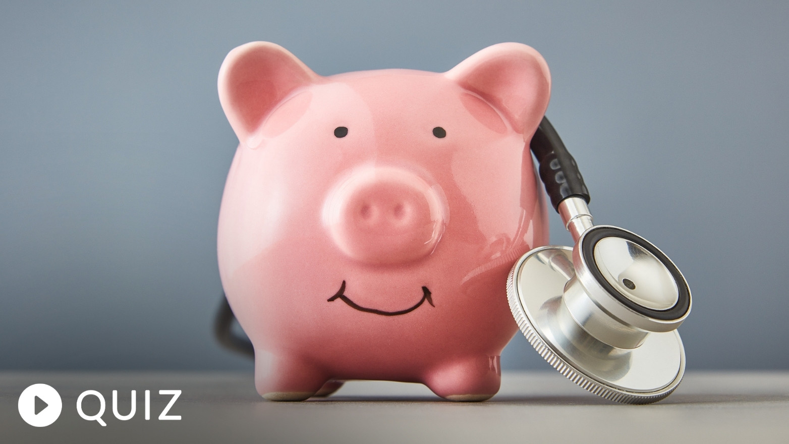 Close-up of a piggy bank with a stethoscope, symbolizing a financial health quiz.