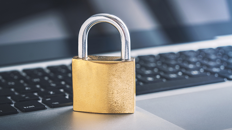 padlock sitting on keyboard