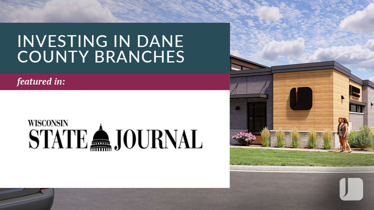 Modern building with logos for a company (right) and Wisconsin State Journal (left), and the text "Investing in Dane County Branches.