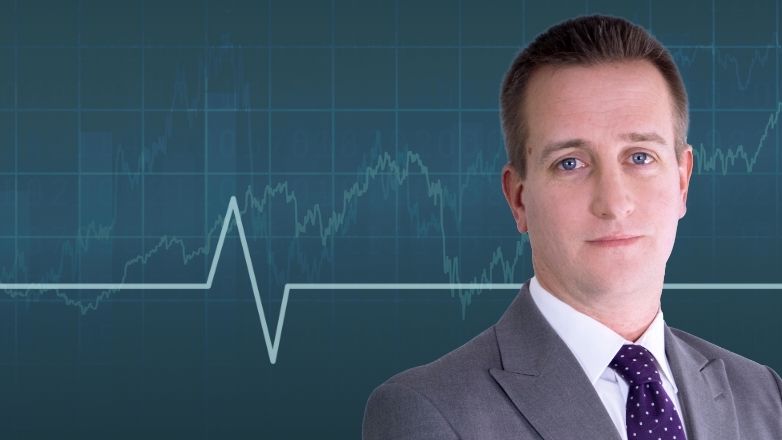 Joe Guerin's headshot overlaid an image of a stock chart.