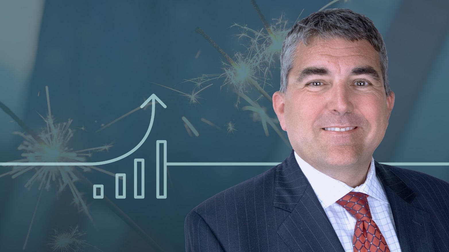 Professional headshot of a man in a suit and red tie, smiling in front of a graphic featuring sparklers and an upward-trending bar chart, symbolizing growth and financial market performance.