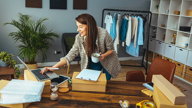 business woman taking inventory of her shop