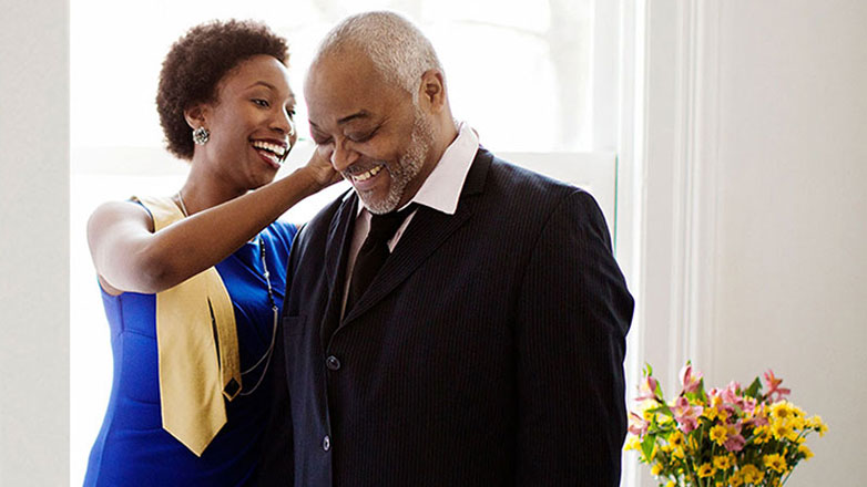 Older couple getting ready for wedding.