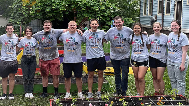 A group of Johnson Financial Group interns pose after a day spent volunteering in the community.