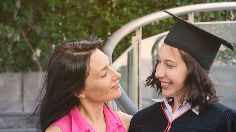 Daughter with her proud mom on graduation day.