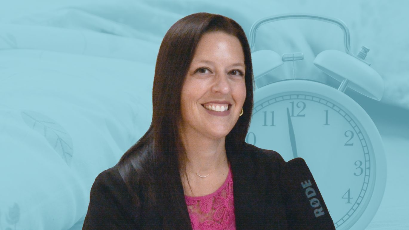 Video thumbnail featuring a person seated beside a podcast microphone, with an alarm clock and bedroom setting displayed in the background.