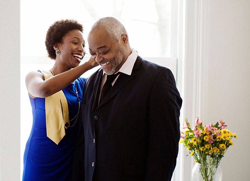 Older couple getting ready for wedding.