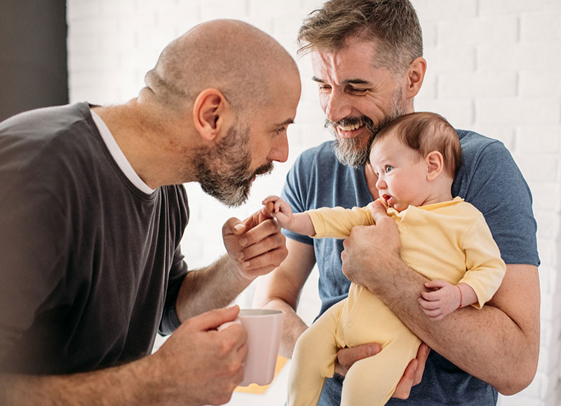 Family says good morning to new baby.