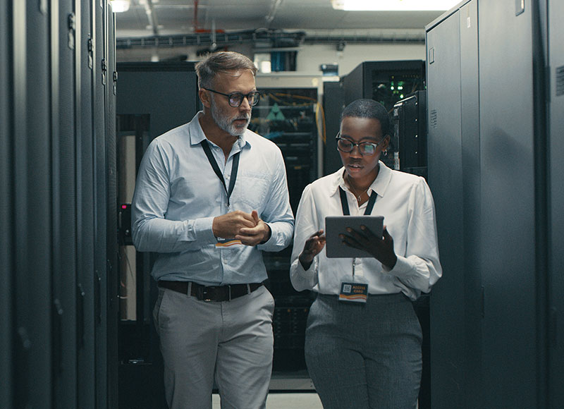 Associates in a network room.