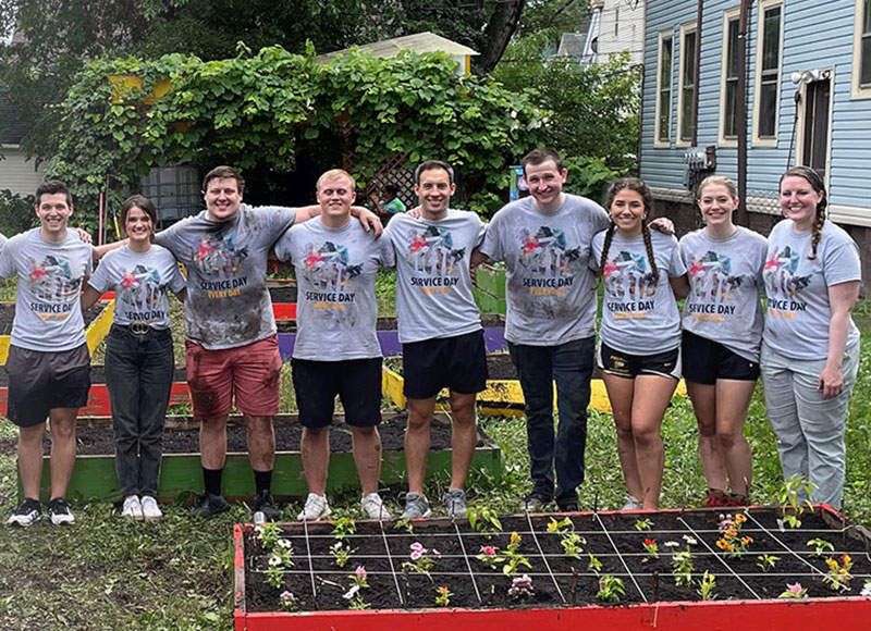 A group of Johnson Financial Group interns pose after a day spent volunteering in the community.